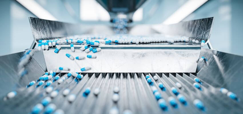 Sorting Pharmaceutical Capsules By A Sorting Machine On A Production Line